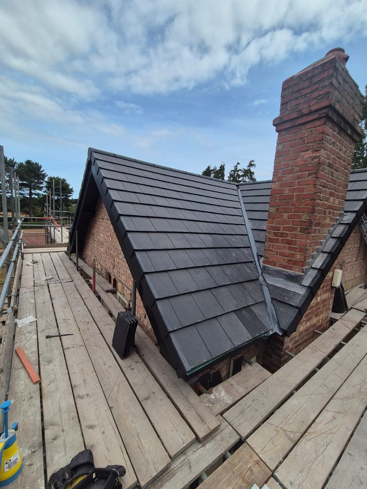 Brick chimney stack re-leaded as part of the re-roof