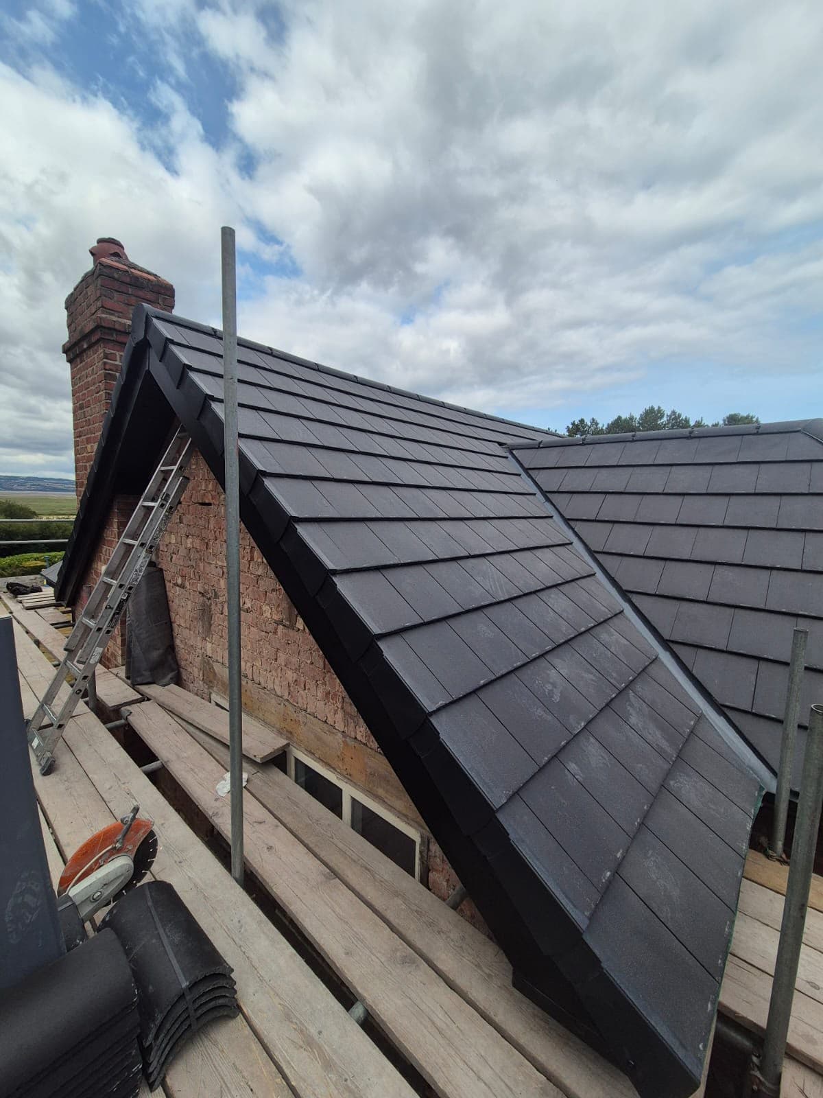 Gable and chimney stack on the completed re-roof