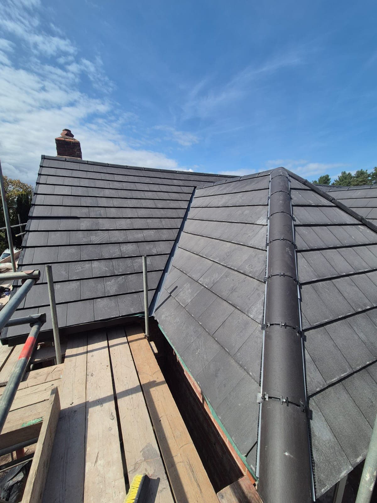 Roofscape showing the hip line with the chimney stack beyond