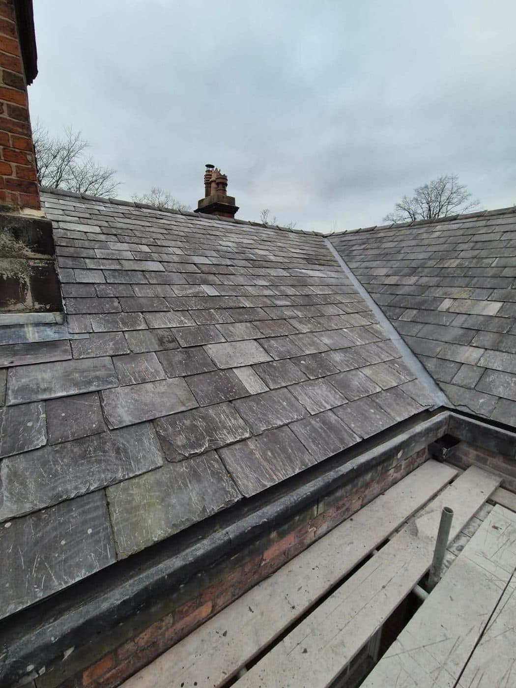 New torch-on felt box gutter between roof pitches, Oxton