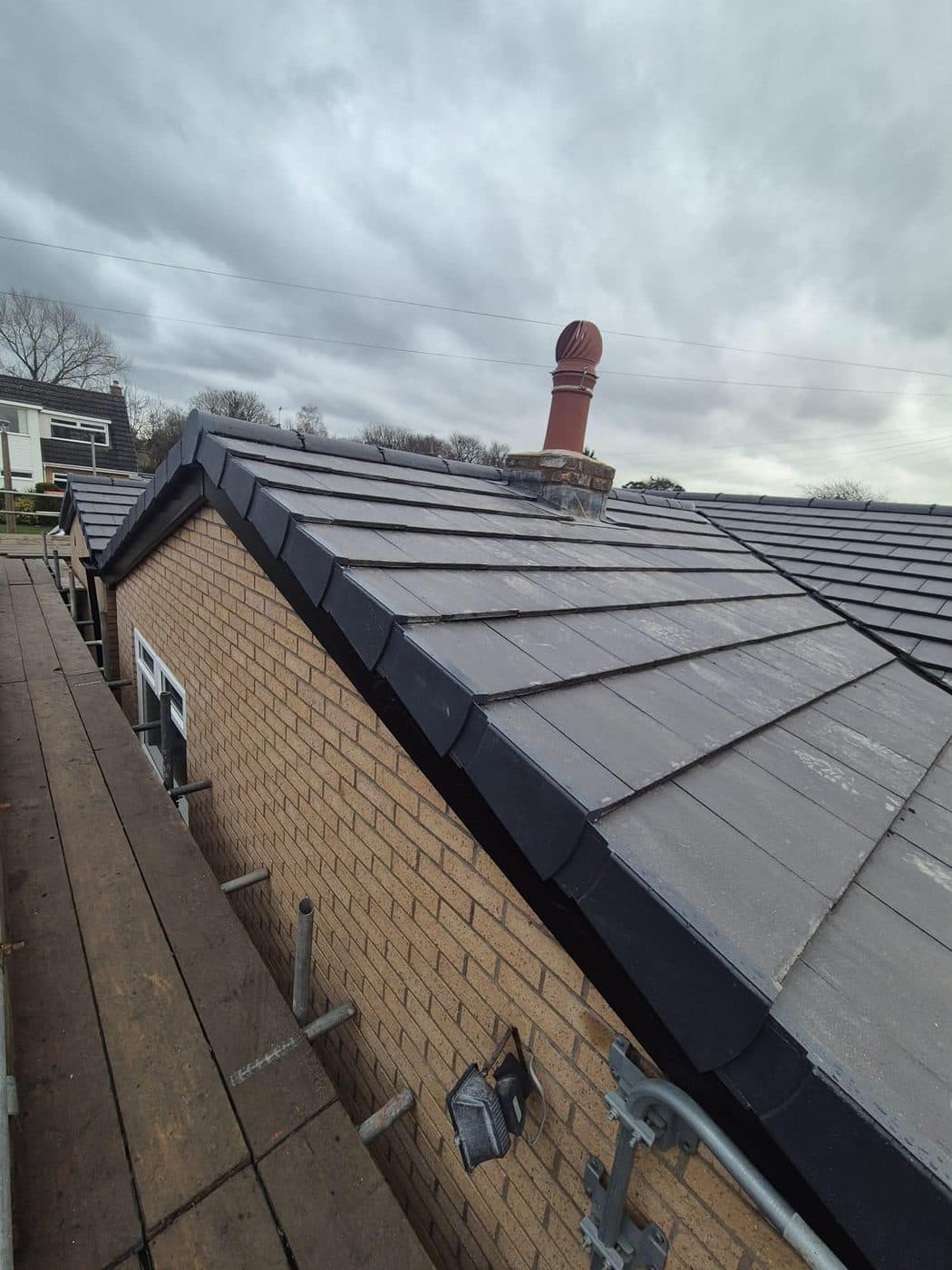 Chimney stack re-leaded with new soakers, flashings and aprons, Parkgate